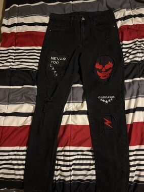 Shein  Black Distressed Patch Jeans with Red Skull and Slogan